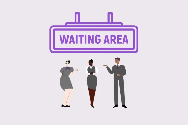 waiting area sign with Delta flight attendants