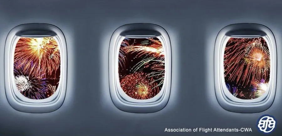 plane window with fireworks